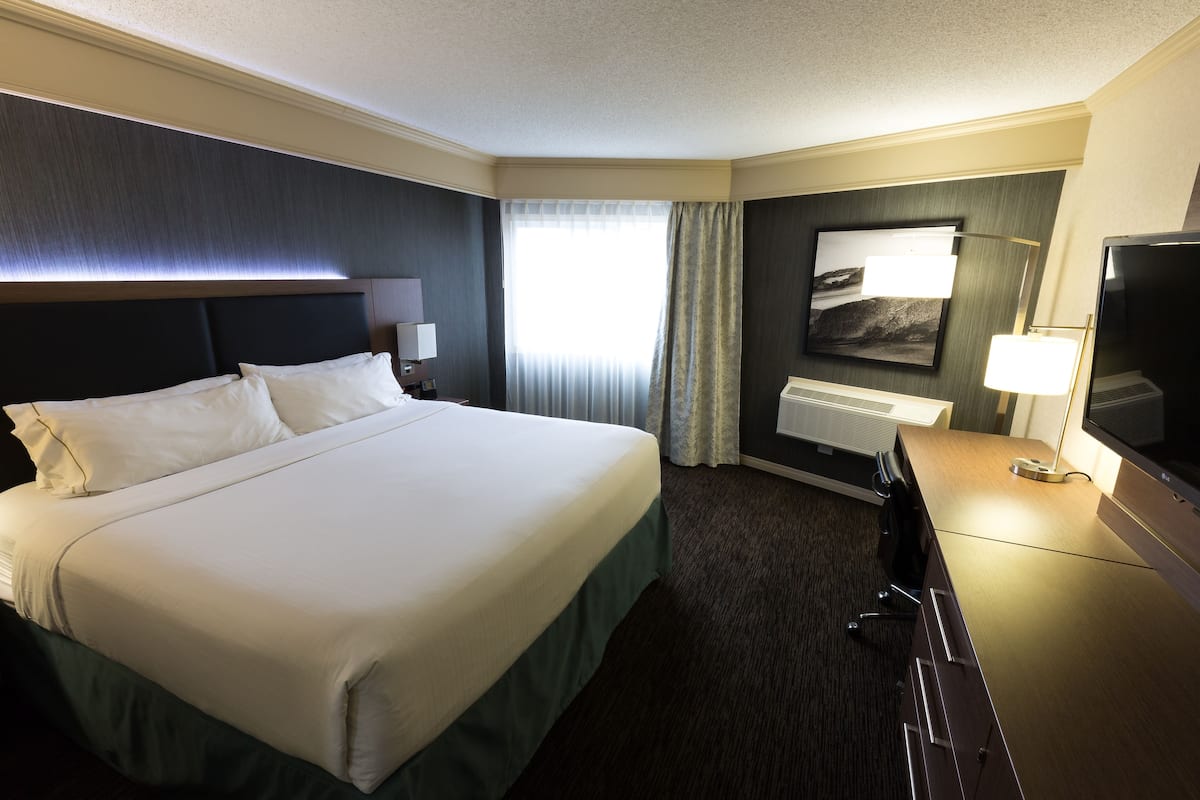 Premium bedding, down comforters, memory foam beds, in-room safe