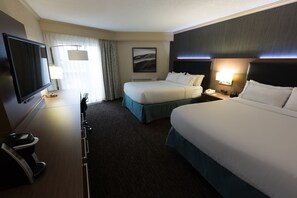 Premium bedding, down comforters, memory foam beds, in-room safe