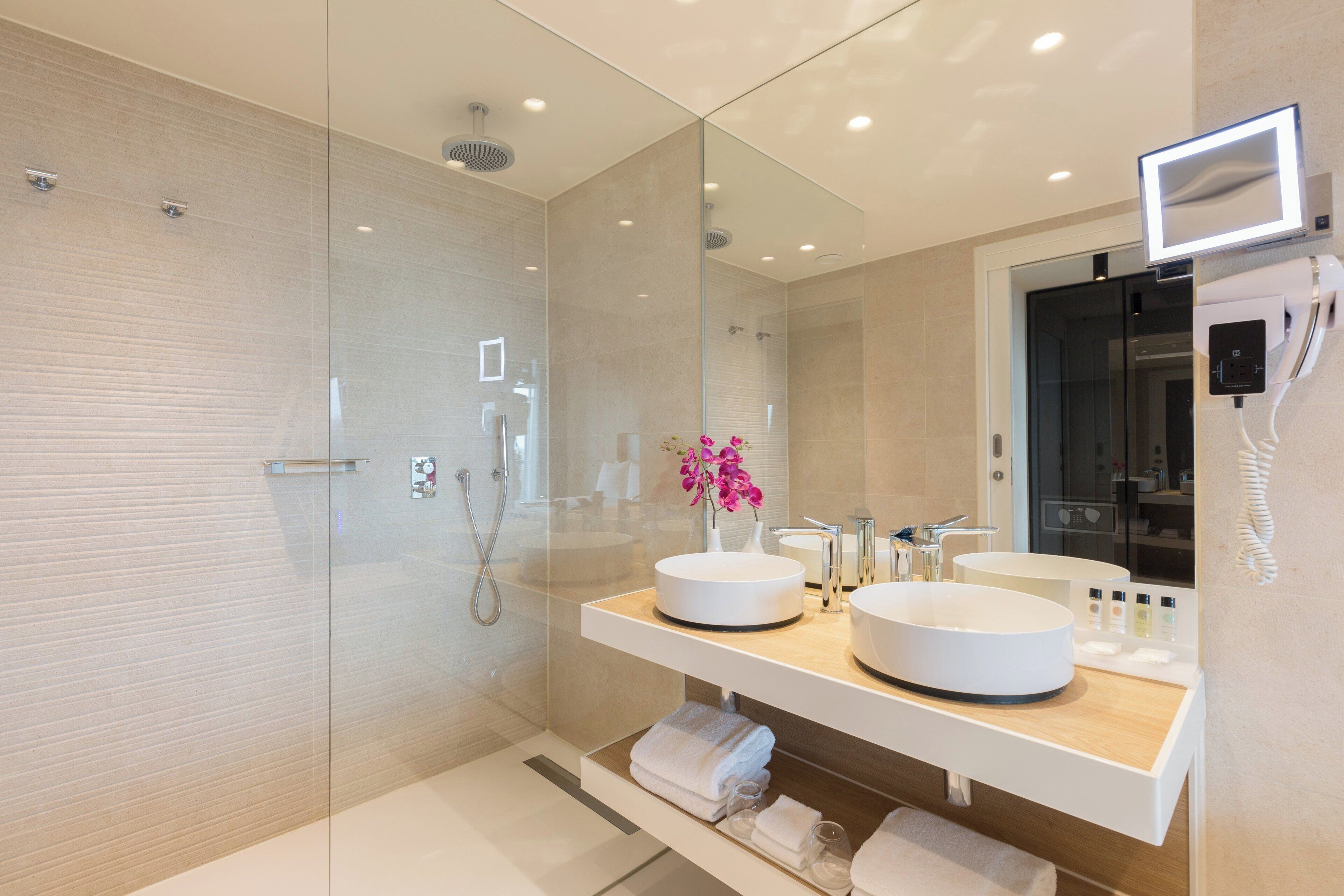 free toiletries, hair dryer, bathrobes, slippers