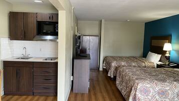 Standard Room, 2 Double Beds | Private kitchen | Fridge, microwave, coffee/tea maker