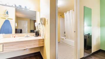 Standard Room, 1 King Bed, Non Smoking | Bathroom | Combined shower/tub, free toiletries, hair dryer, towels