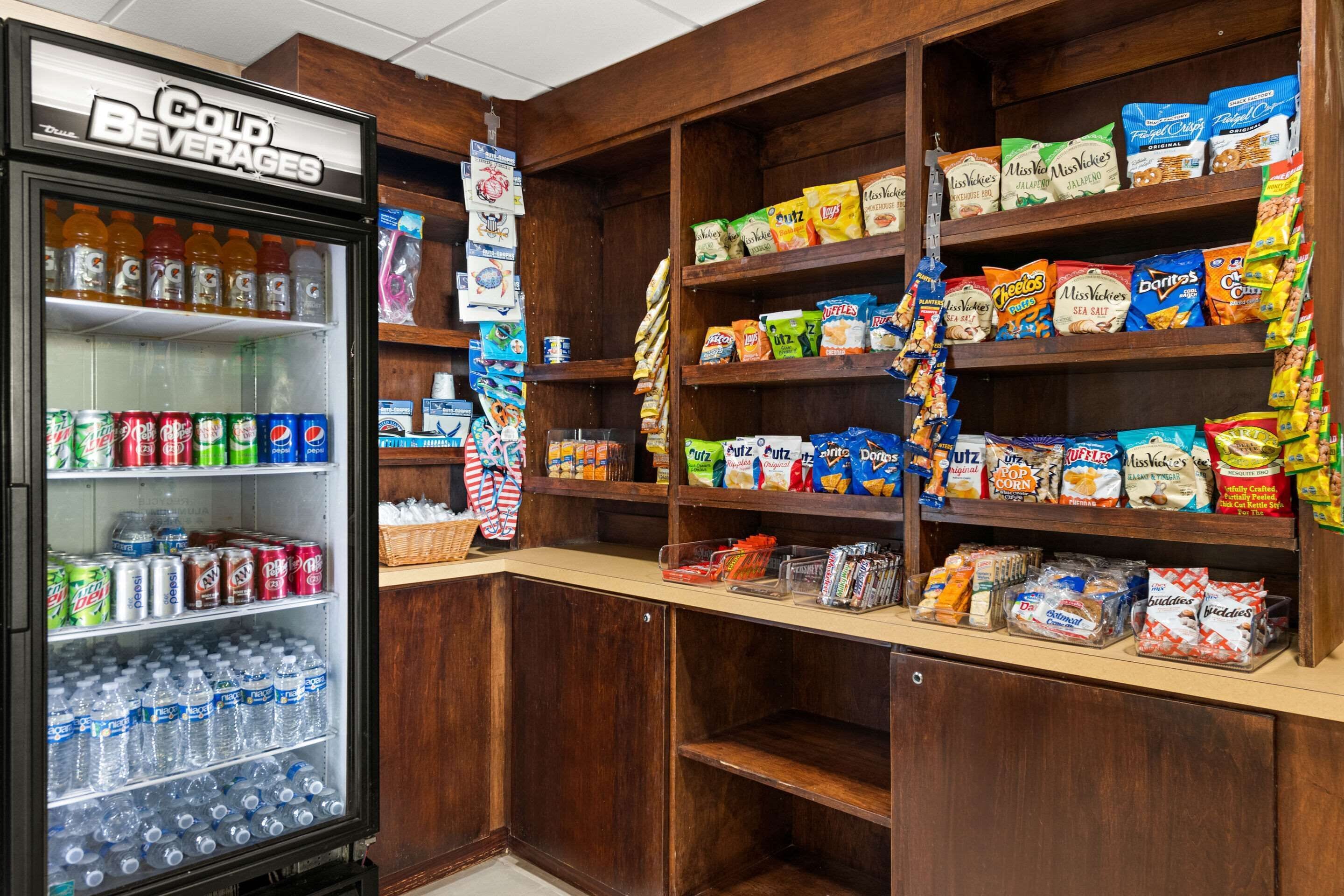 A snack and beverage vending area with a variety of snacks and drinks.