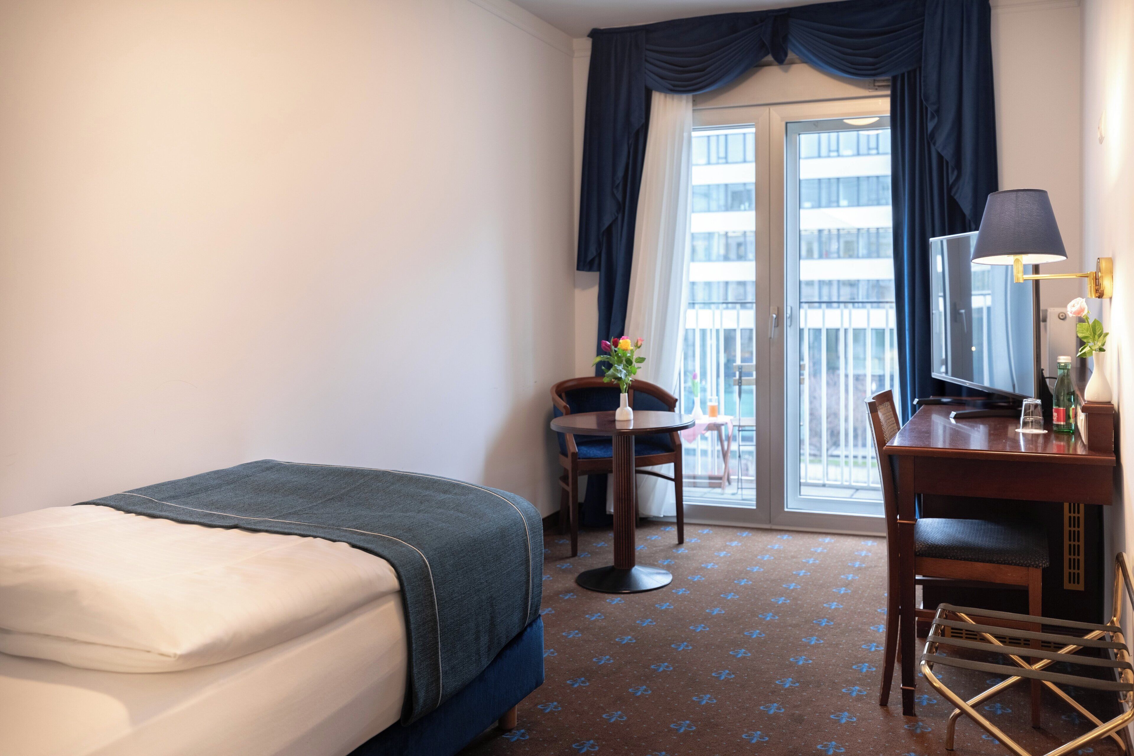 Standaard kamer, 1 eenpersoonsbed, balkon | Een kluis op de kamer, een bureau, geluiddichte muren, gratis babybedden