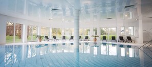 Indoor pool, outdoor pool, pool umbrellas, sun loungers