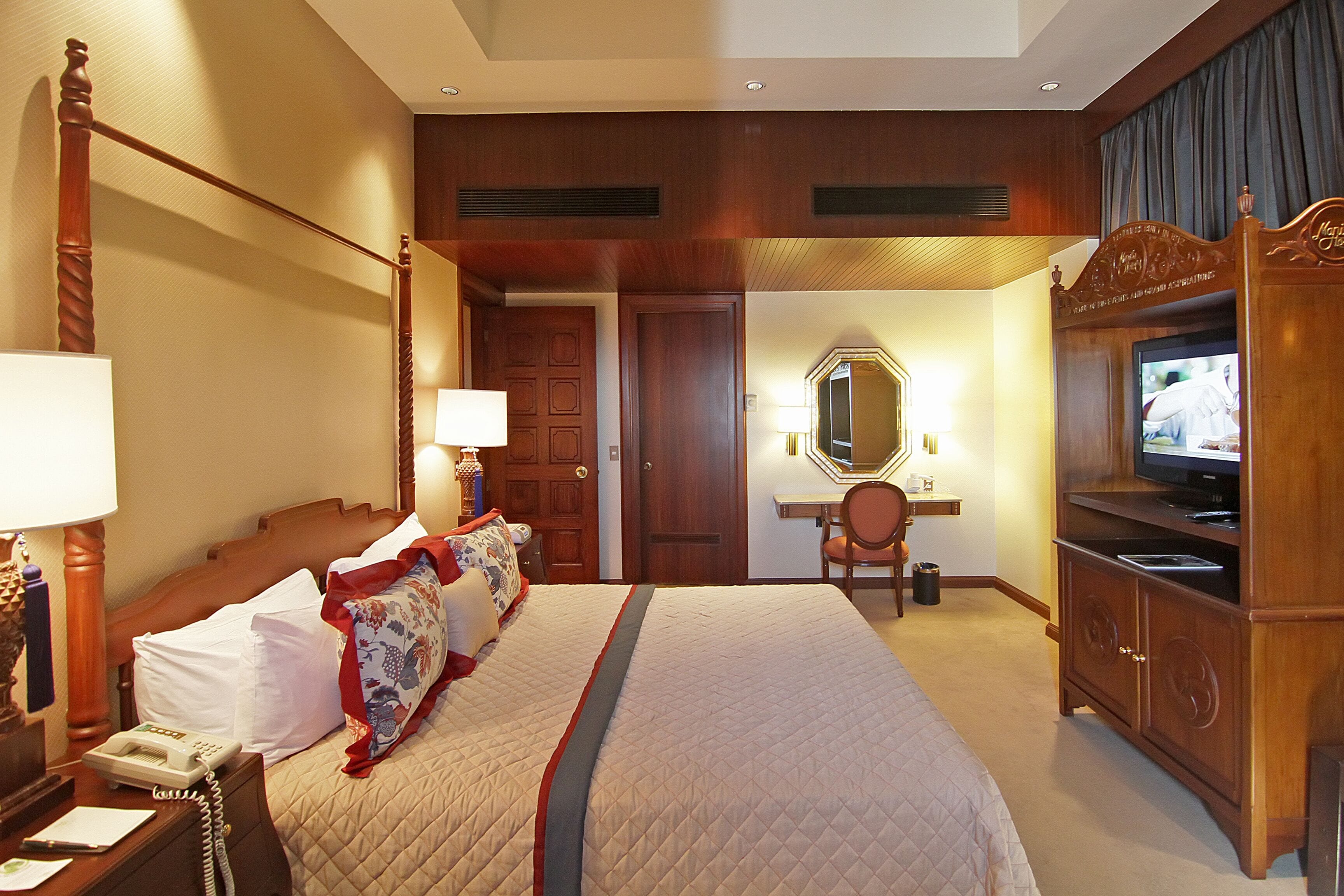 intramuros suite | in-room safe, desk, blackout curtains, iron/ironing board