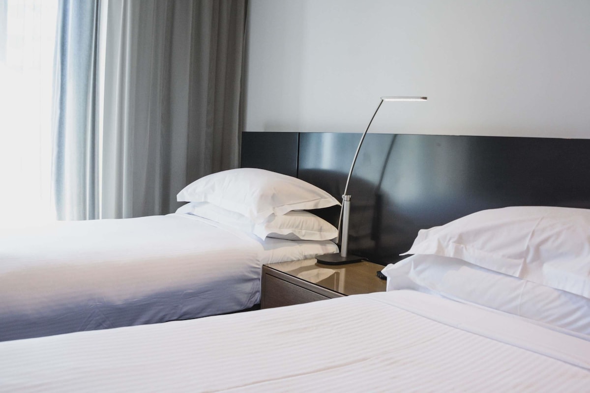 Premium bedding, pillowtop beds, minibar, in-room safe