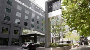 A modern building with a sign reading "The COMO Melbourne." - The Como Melbourne by Accor (South Yarra)