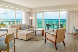 Club Suite, 1 King Bed | Living area | 37-inch LED TV with satellite channels, TV