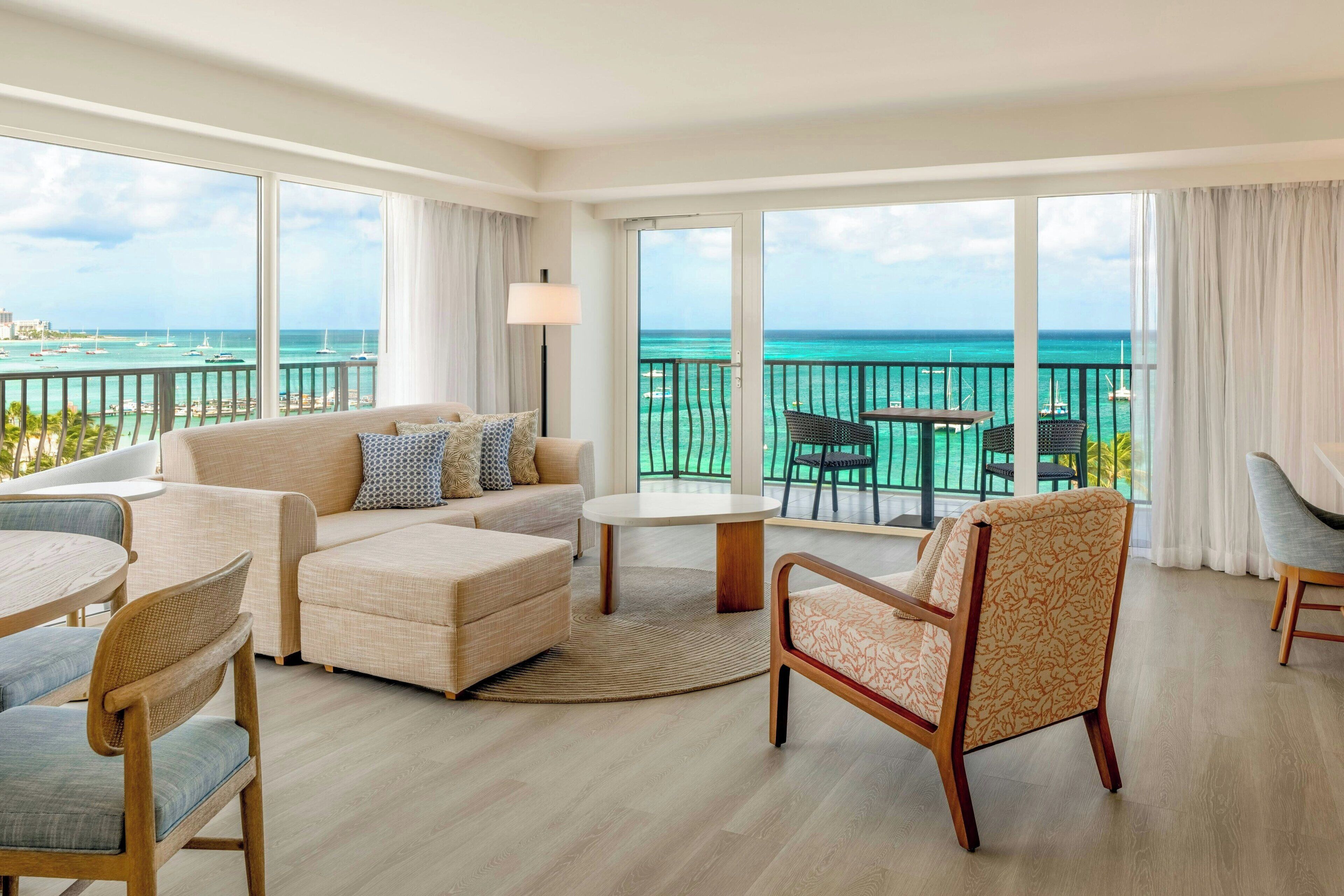 Suite, 1 King Bed with Sofa bed, Club Lounge Access, Oceanfront (Tradewinds, Adults Only) | Living area | 37-inch LED TV with satellite channels, TV