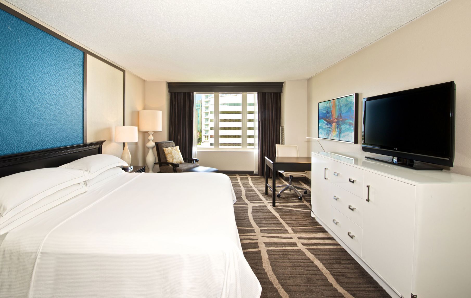 Premium bedding, down comforters, pillowtop beds, in-room safe