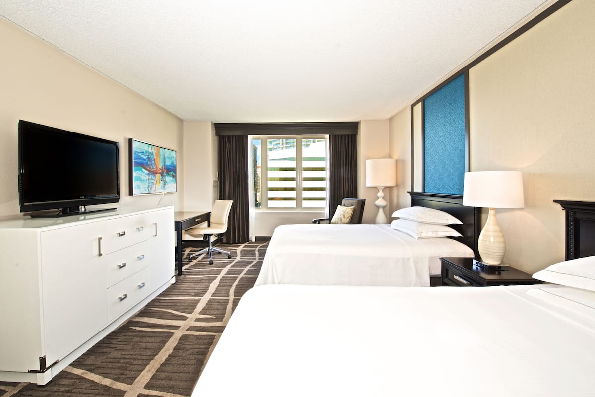 Premium bedding, down comforters, pillowtop beds, in-room safe