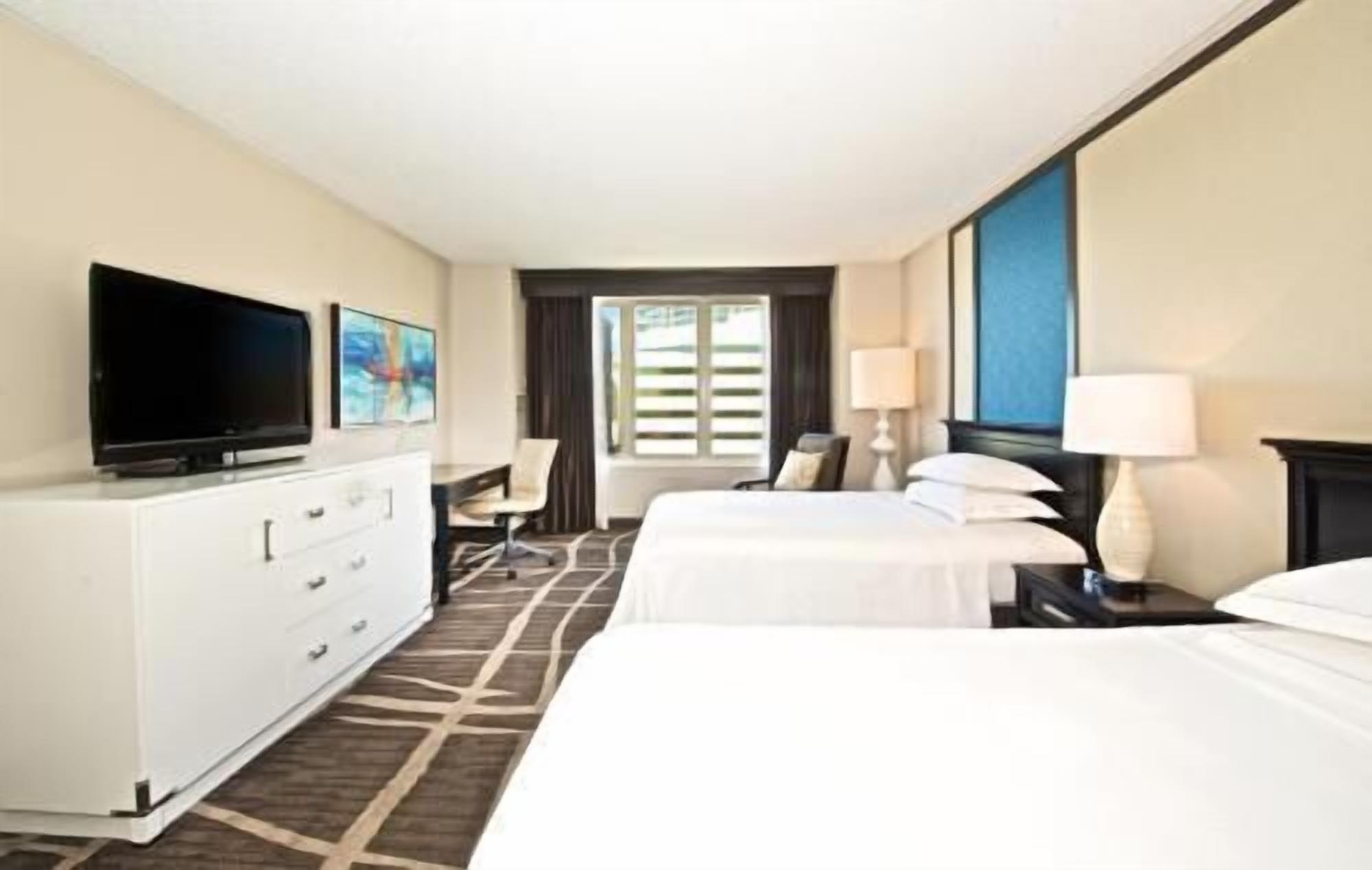 Premium bedding, down comforters, pillowtop beds, in-room safe
