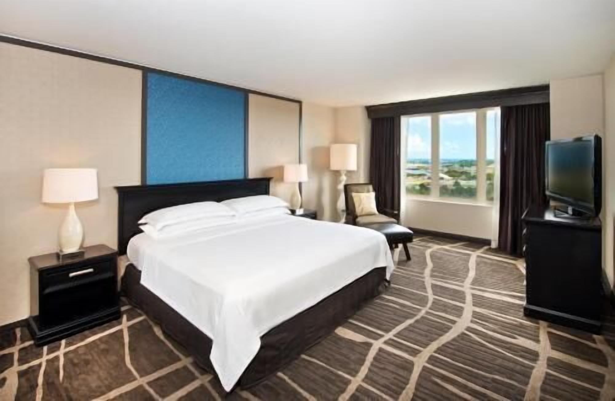Premium bedding, down comforters, pillowtop beds, in-room safe