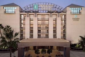 A multi-story building with a prominent 'Embassy Suites' sign. - Embassy Suites by Hilton Brea North Orange County (Brea)