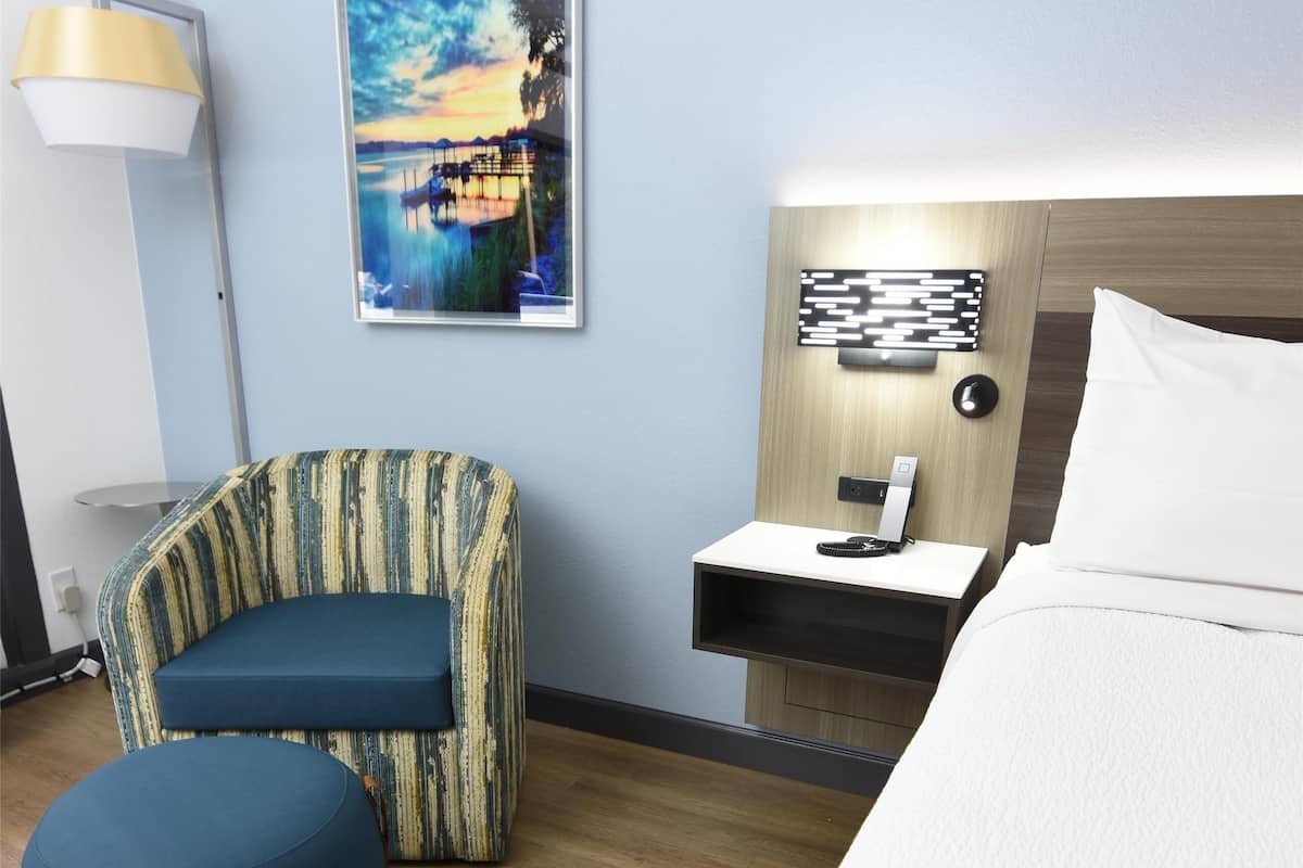 Premium bedding, down duvets, memory-foam beds, in-room safe