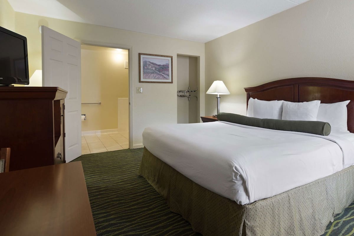Premium bedding, down duvets, memory-foam beds, in-room safe