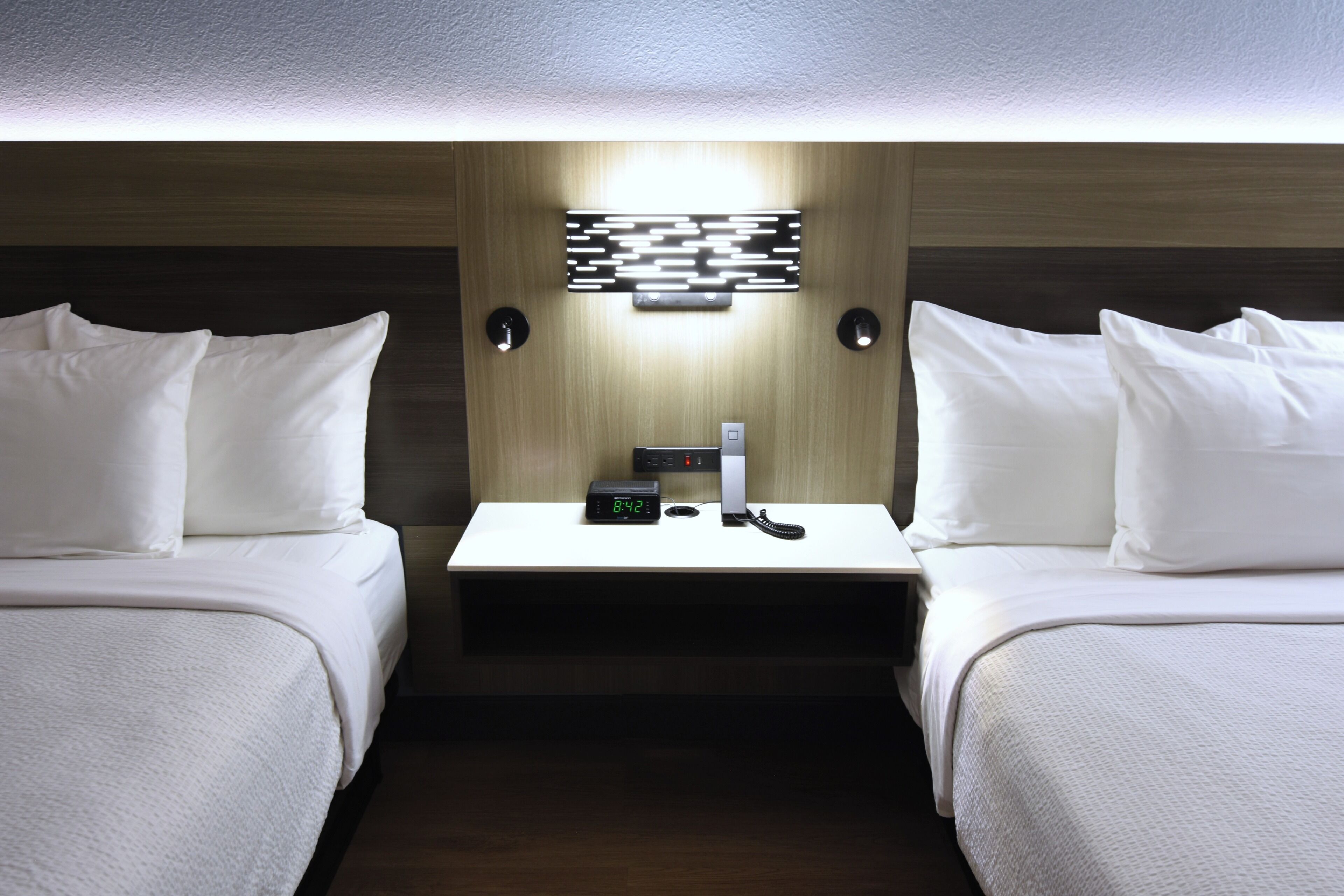 Premium bedding, down comforters, memory foam beds, in-room safe