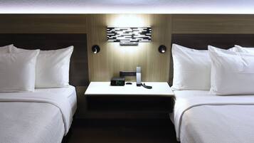 Premium bedding, down duvets, memory-foam beds, in-room safe