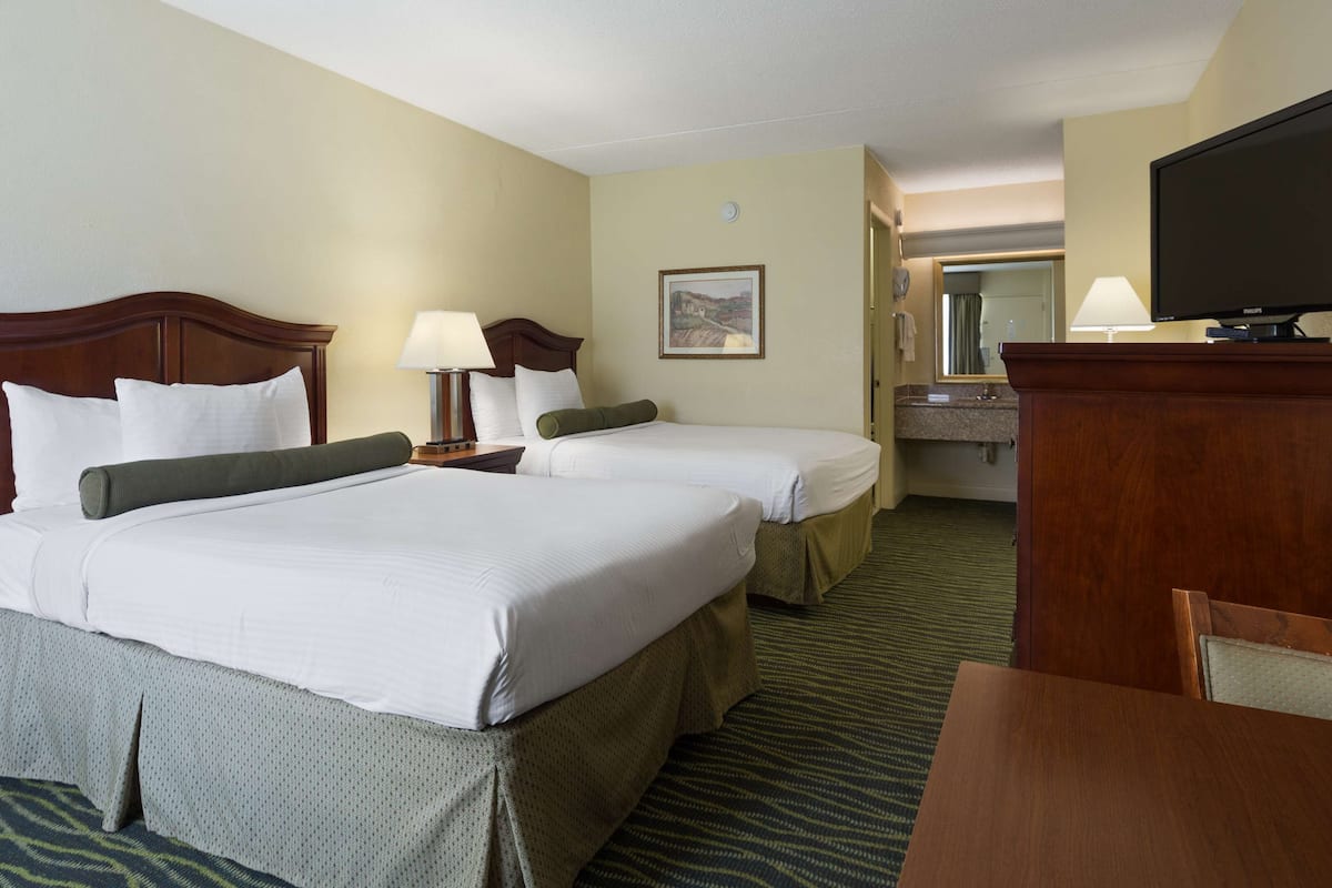 Premium bedding, down comforters, memory foam beds, in-room safe