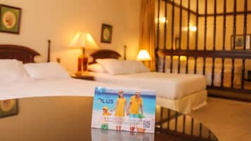 Family Quadruple Room | 1 bedroom, minibar, in-room safe, individually decorated