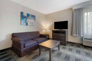 Suite, 1 King Bed, Non Smoking, Kitchenette (Separate Living Room) | Premium bedding, desk, laptop workspace, blackout drapes