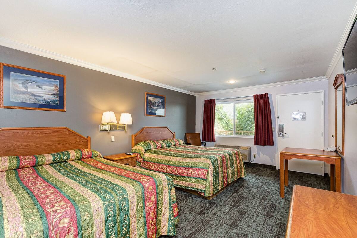 Standard Room, 2 Queen Beds | Desk, iron/ironing board, WiFi (free), bed sheets