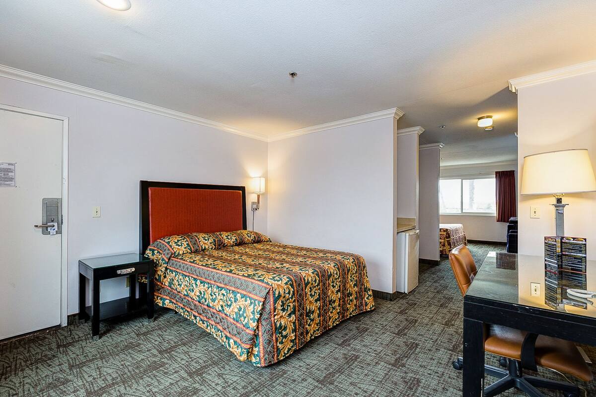 Deluxe Room, 2 Queen Beds | Desk, iron/ironing board, WiFi (free), bed sheets