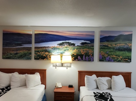 Desk, laptop workspace, blackout drapes, iron/ironing board