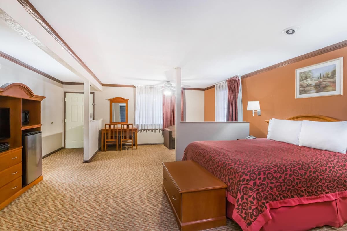 Suite estudio Deluxe, 1 cama de matrimonio grande con sofá cama, no fumadores | Escritorio, espacio para trabajar con un portátil, cortinas opacas