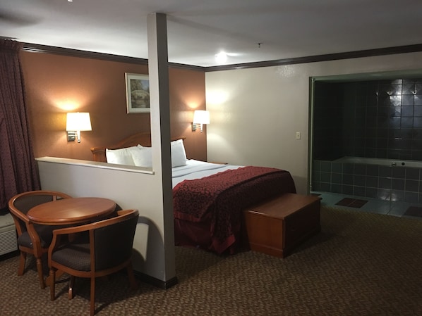 Studio Suite, 1 King Bed, Smoking | Desk, laptop workspace, blackout drapes, iron/ironing board