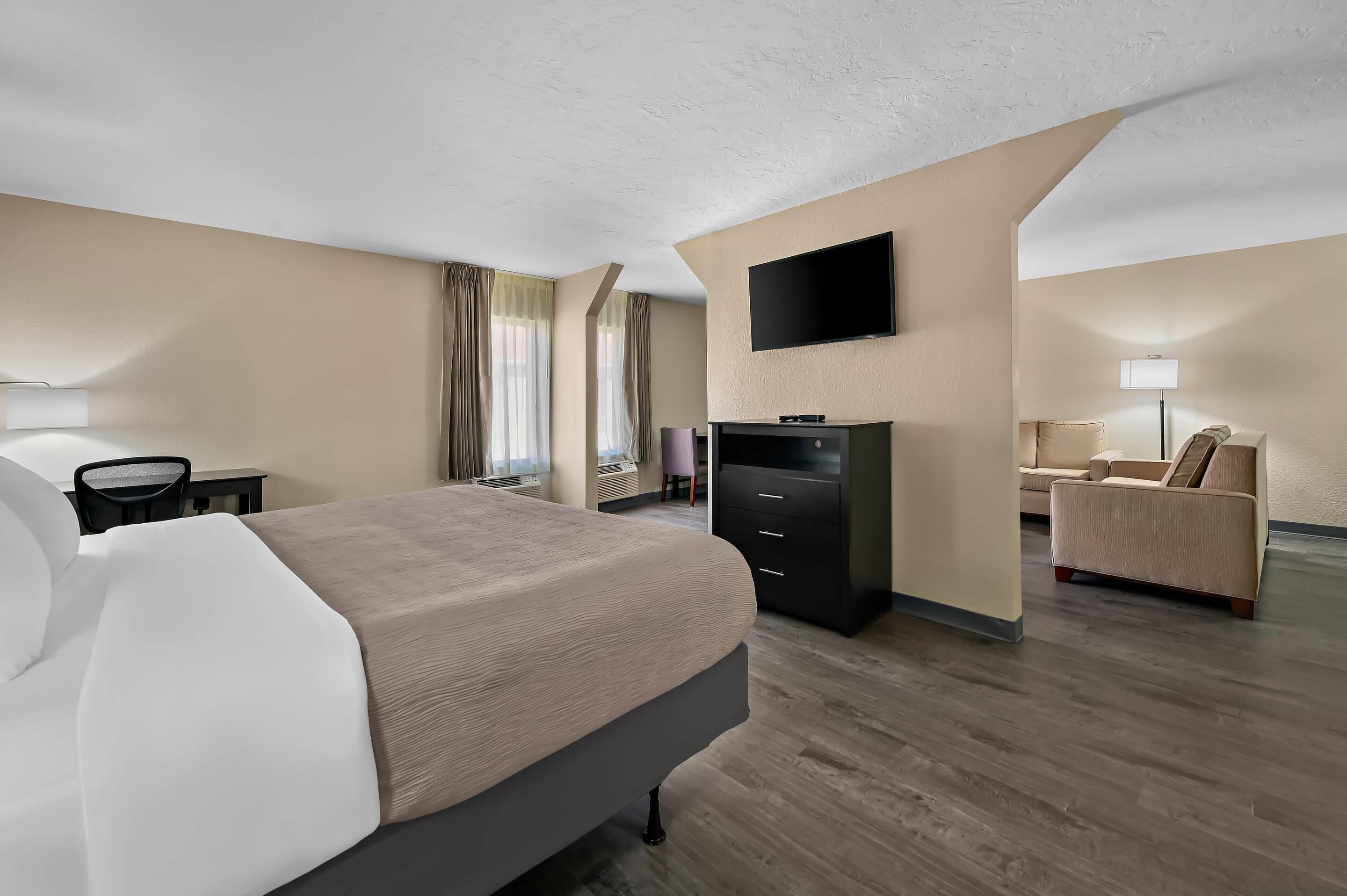 Premium bedding, down comforters, desk, laptop workspace