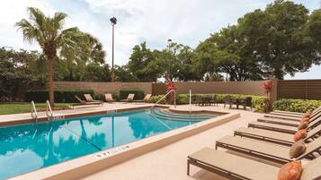 Indoor pool, outdoor pool, open 6:00 AM to 10:00 PM, sun loungers