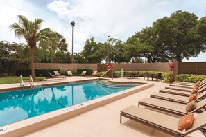 Outdoor pool, open 8:00 AM to 10:00 PM, sun loungers