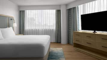 Suíte, 1 cama King e sofá-cama, acessível, banheira | Roupas de cama premium, cofres nos quartos, escrivaninha