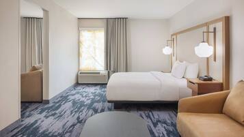 Suite, 1 King Bed with Sofa bed (Mobility/Hearing Access, Roll-in Shwr) | Down comforters, desk, blackout drapes, iron/ironing board