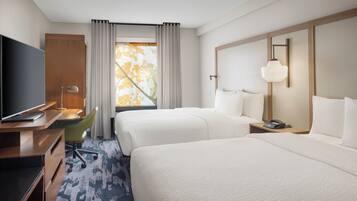 Selimut bulu angsa, meja kerja, dan tirai kedap cahaya