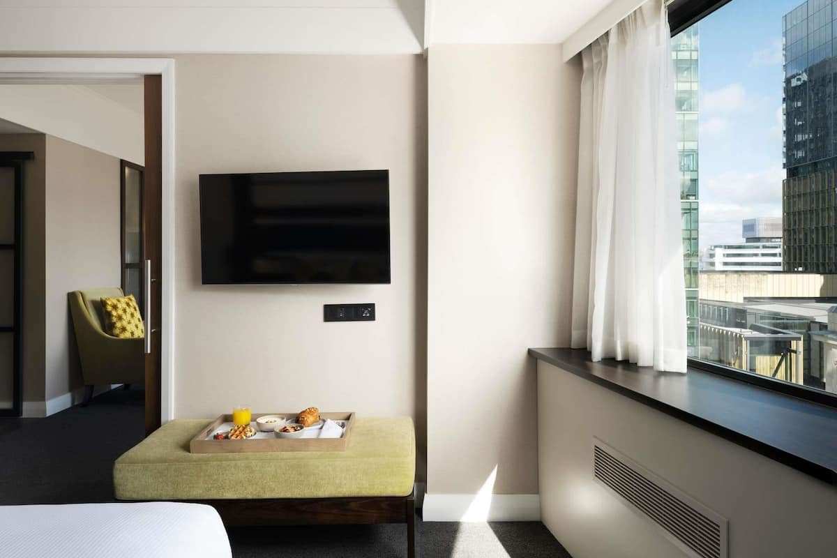 Junior Suite, 1 King Bed | In-room safe, desk, laptop workspace, blackout drapes