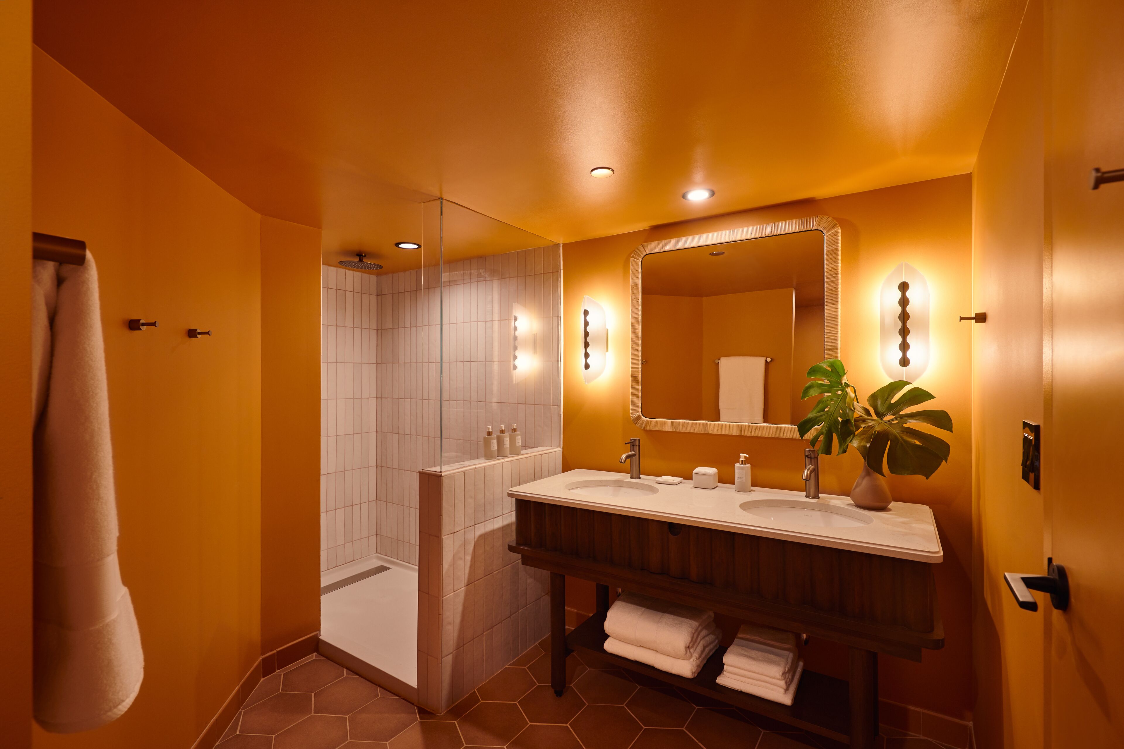 rainfall showerhead, designer toiletries, hair dryer, bathrobes