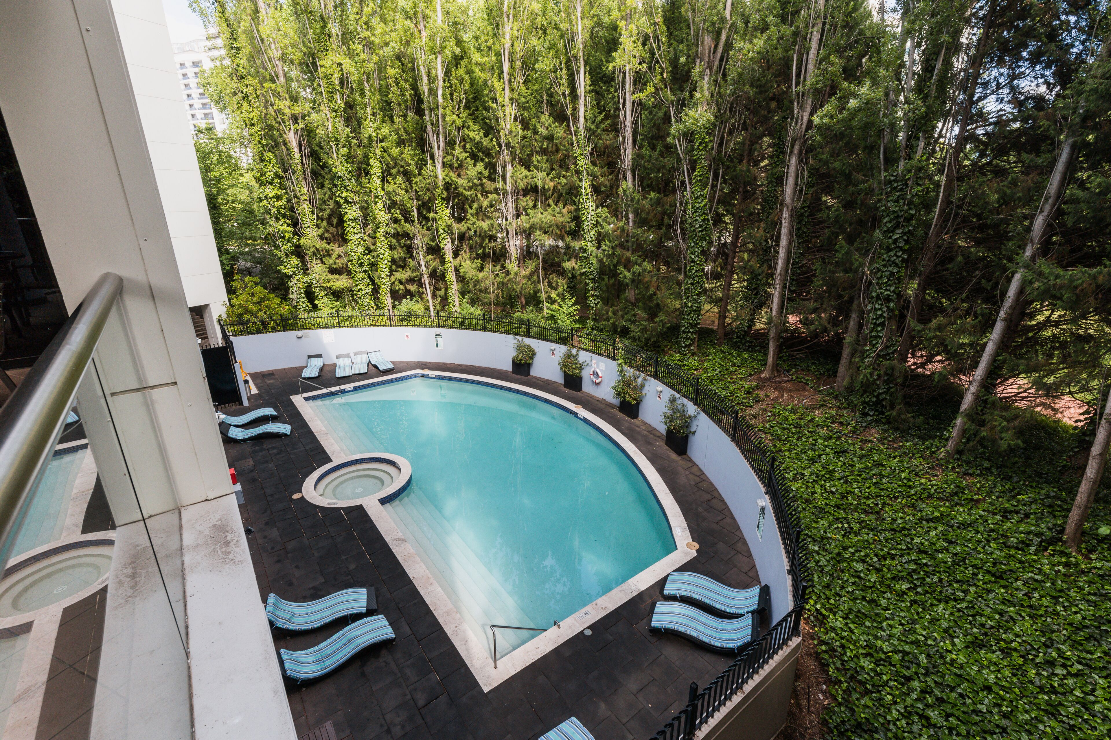 seasonal outdoor pool, pool umbrellas, pool loungers