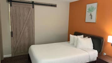 Tabla de planchar con plancha, wifi gratis, ropa de cama