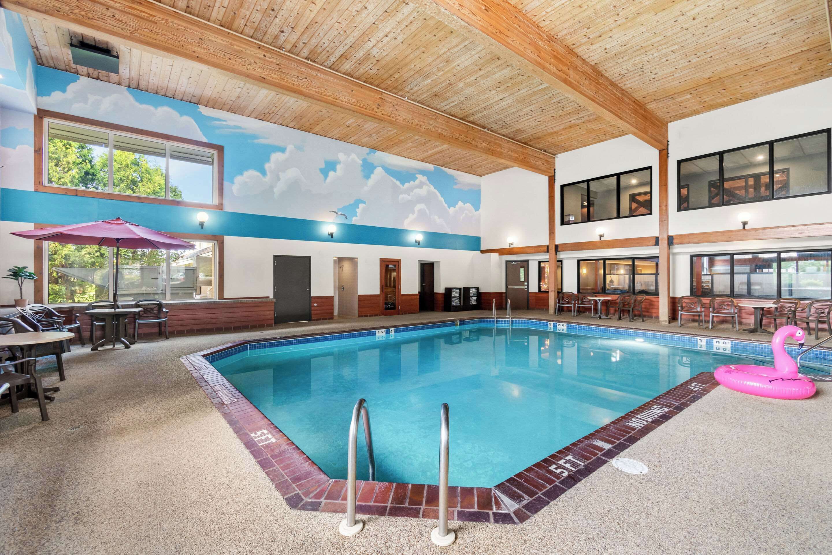 indoor pool, open 8:00 am to 11:00 pm, pool umbrellas