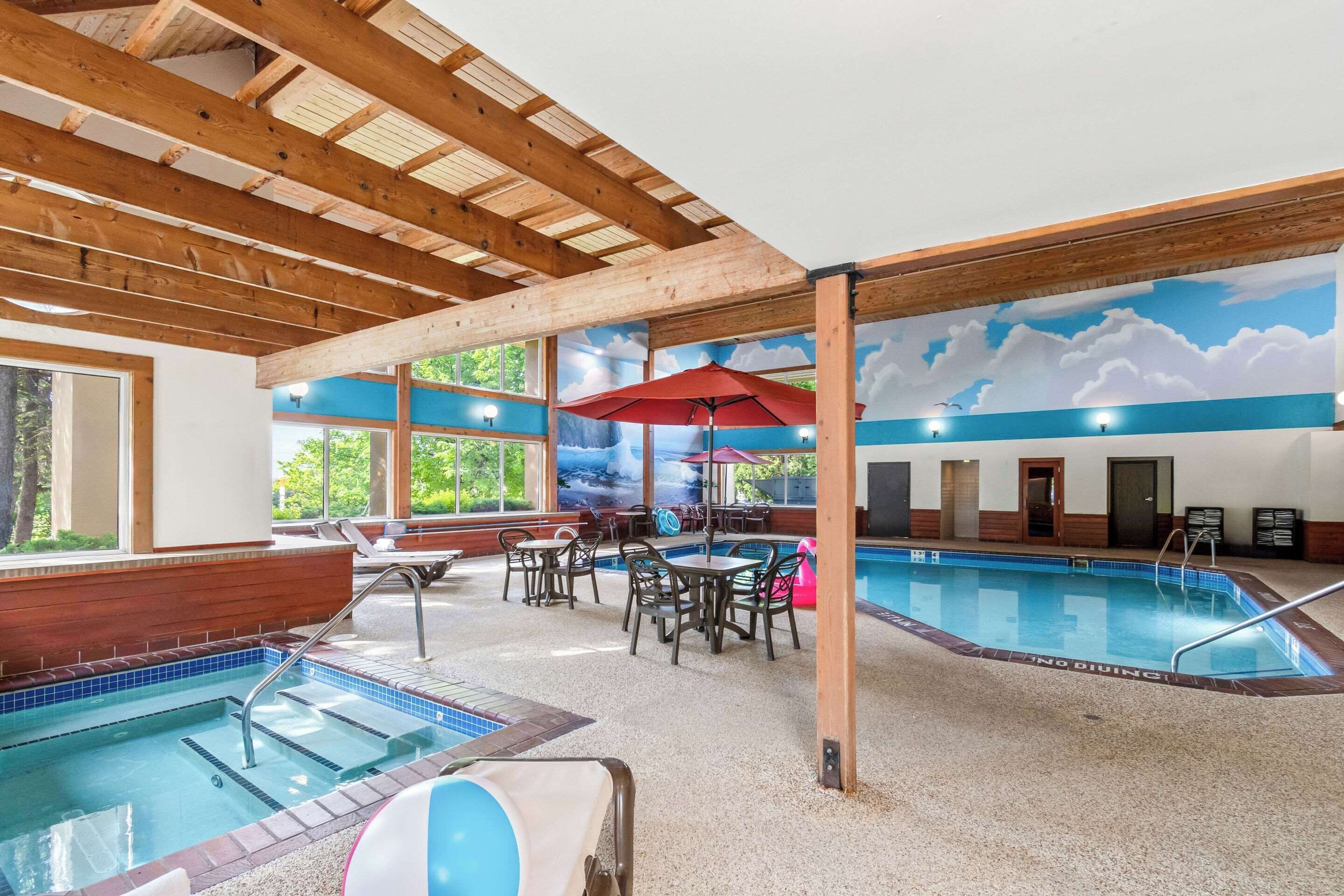 indoor pool, open 8:00 am to 11:00 pm, pool umbrellas