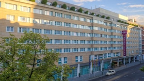 A multi-story hotel with a modern design, featuring a prominent 'Crown Plaza' sign. - Crowne Plaza Berlin City Centre by IHG (Berlin)
