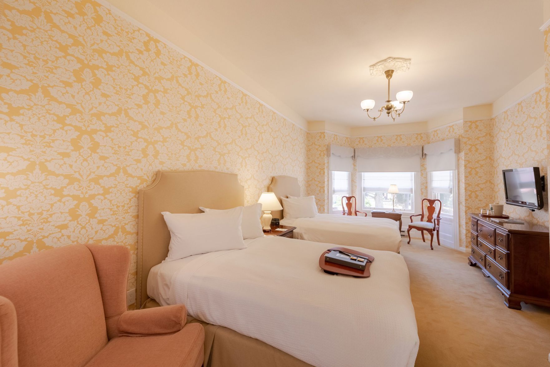Premium bedding, down duvets, pillow-top beds, individually decorated