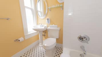Combined shower/bathtub, designer toiletries, hair dryer, towels