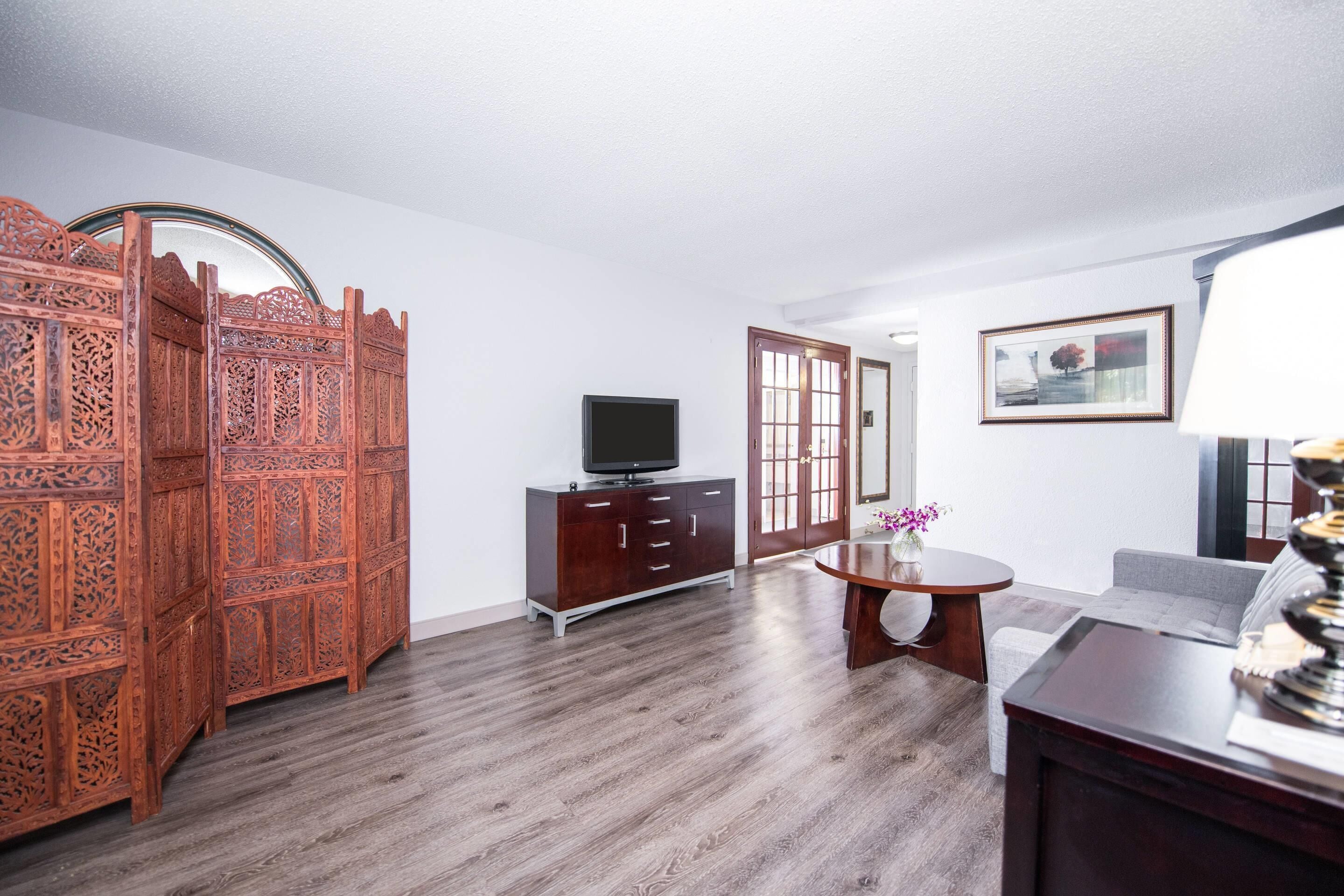 Desk, laptop workspace, blackout curtains, iron/ironing board