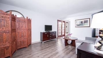 Desk, laptop workspace, blackout curtains, iron/ironing board