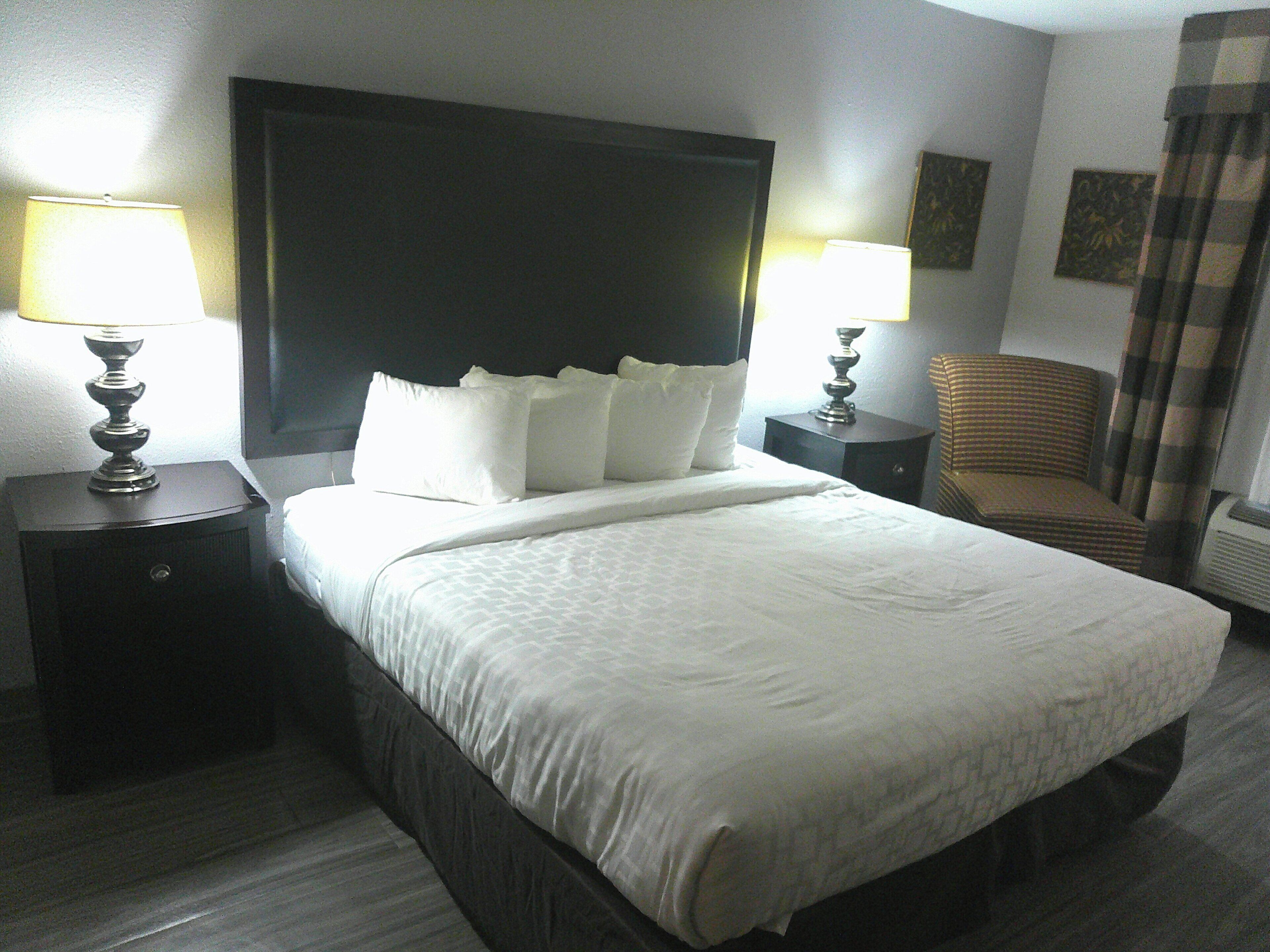 Desk, laptop workspace, blackout drapes, iron/ironing board