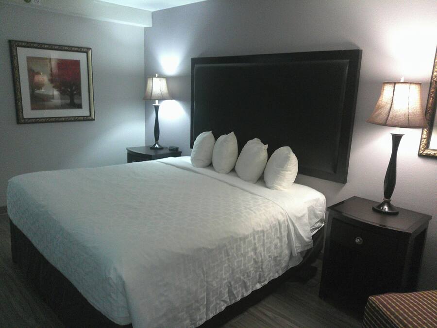 Desk, laptop workspace, blackout curtains, iron/ironing board