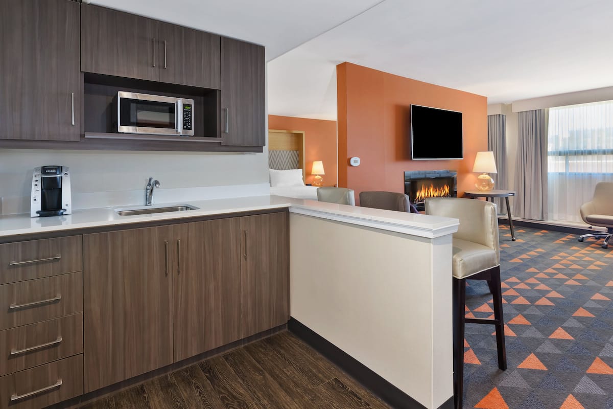 suite, 1 king bed with sofa bed | 1 bedroom, in-room safe, desk, iron/ironing board